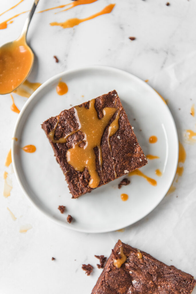 Trader Joe's Brownie with caramel sauce, shot by food photographer Rebecca Hales