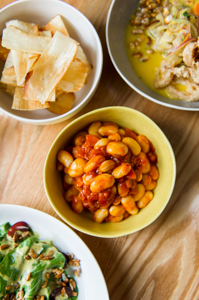 Flatlay of dinner spread at Llama Inn, shot by food photographer Rebecca Hales