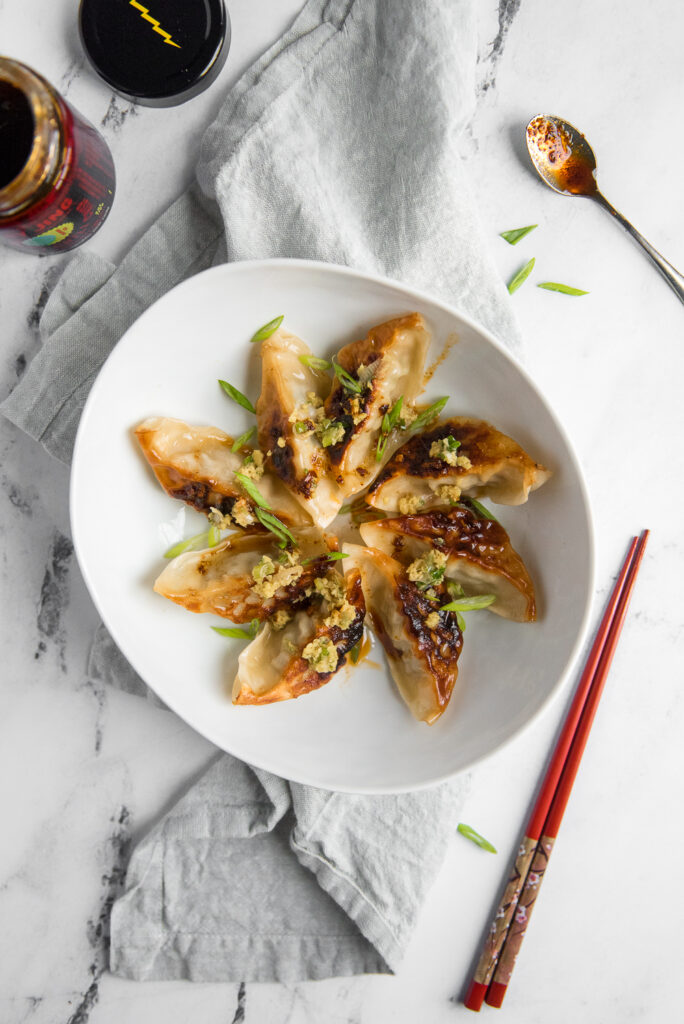 Trader Joe's pork dumplings with Fly by Jing sauce and ginger scallion dressing