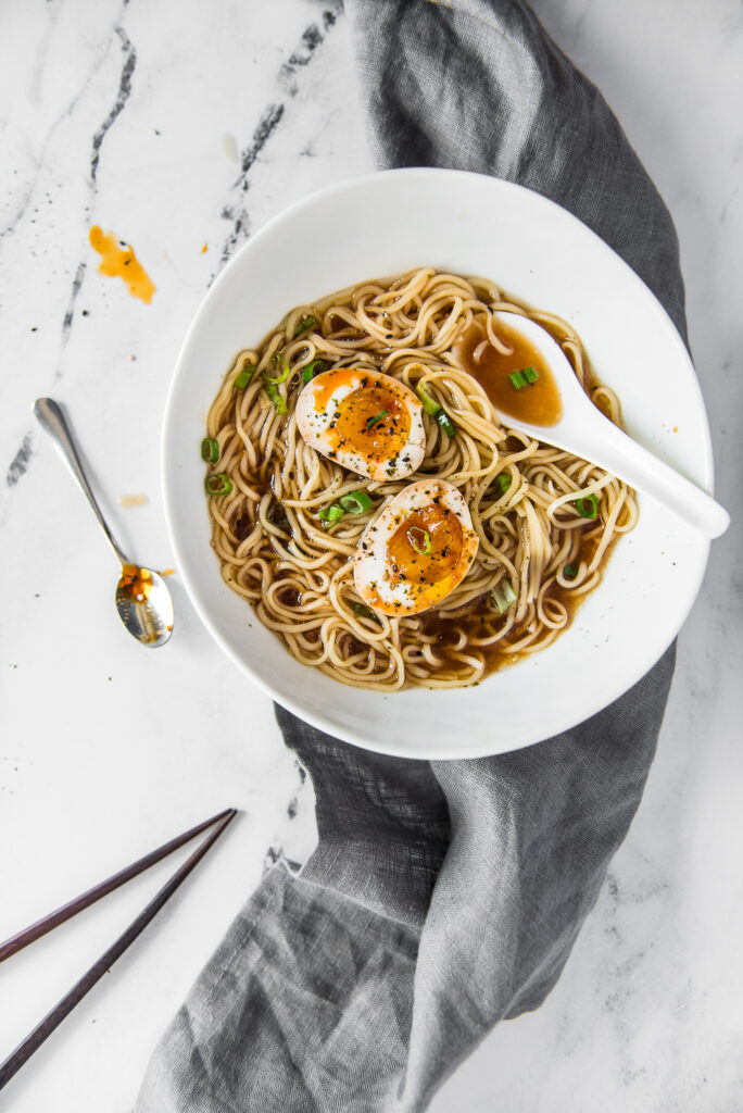 Ramen with homemade soy eggs, shot by food photographer Rebecca Hales