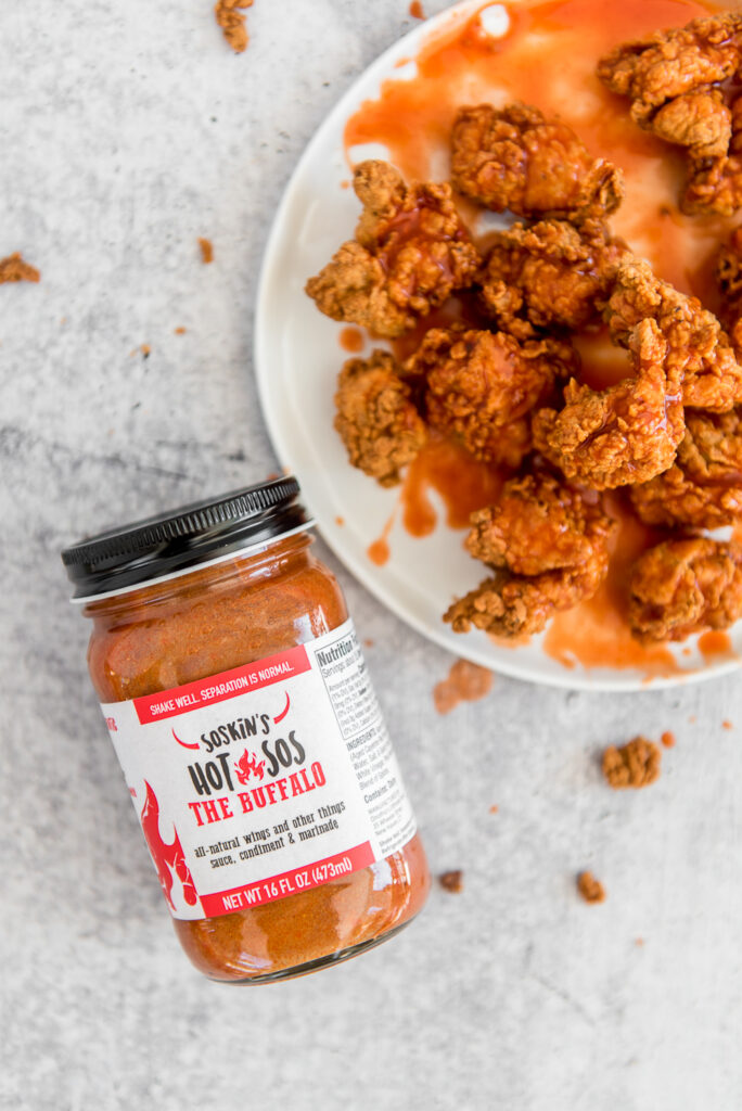 Fried chicken nuggets with Soskins Hot Sauce, shot by food photographer Rebecca Hales