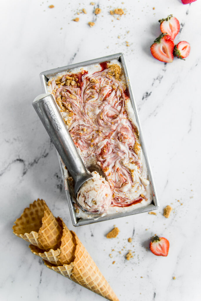 homemade strawberry cheesecake ice cream with fresh strawberries, photographed by Connecticut-based food photographer Rebecca Hales