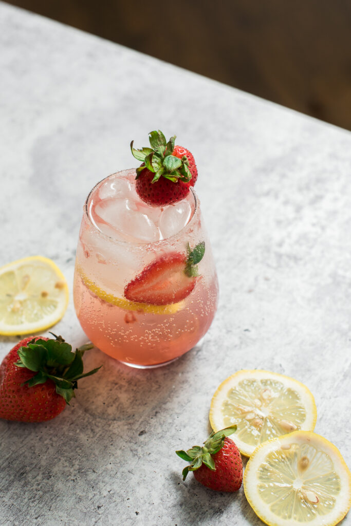 non alcoholic drink with spindrift, lemon and starwberries, photographed by Connecticut-based food photographer Rebecca Hales